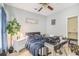 Cozy bedroom with a ceiling fan and a large window for natural light at 4203 Jordans Bank, Union City, GA 30291