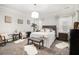 Serene main bedroom featuring elegant decor, soft lighting, and a comfortable bed at 4203 Jordans Bank, Union City, GA 30291