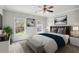 Comfortable bedroom with picture windows that bring in natural light to highlight the stylish decor at 549 Henry Dr, Marietta, GA 30064