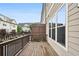 Private deck with wood railing offering views of the neighborhood at 549 Henry Dr, Marietta, GA 30064