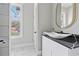 Chic bathroom featuring vessel sink, black granite, and modern tile at 1081 Napier Se St, Atlanta, GA 30316