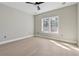 Spacious bedroom with a ceiling fan and large window with abundant natural light at 1081 Napier Se St, Atlanta, GA 30316