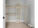 Unfinished closet with custom shelving and ample storage space at 1081 Napier Se St, Atlanta, GA 30316