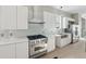 Bright kitchen with stainless steel appliances, modern countertops, and ample cabinet space at 1081 Napier Se St, Atlanta, GA 30316