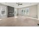 Bright living room featuring hardwood floors, a sleek fireplace, recessed lighting, and lots of natural light at 1081 Napier Se St, Atlanta, GA 30316