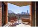 Charming balcony with bench and skyline views of the city at 395 Central Park Ne Pl # 420, Atlanta, GA 30312