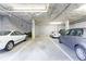 Spacious parking garage with multiple vehicles and designated parking spaces at 395 Central Park Ne Pl # 420, Atlanta, GA 30312