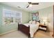 Bedroom with a window, carpeted floors, and light green walls at 5352 Waterford Dr, Dunwoody, GA 30338