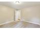 Bedroom with plush carpet and a view to another room at 645 Trailmore Pl, Roswell, GA 30076