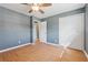 Bedroom with a large closet, wood floors, and access to the bathroom at 401 Cabriolet Ct, Mcdonough, GA 30253