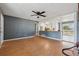 Open-concept living area flows to the kitchen, featuring an open wall design and natural light at 401 Cabriolet Ct, Mcdonough, GA 30253