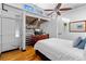 Loft bedroom featuring wood floors, closet, and a chest of drawers at 964 Dekalb Ne Ave # 112, Atlanta, GA 30307