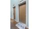 Entrance to a unit in the Marble complex with a 'Home' welcome mat at 964 Dekalb Ne Ave # 112, Atlanta, GA 30307