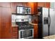 Close-up of the modern kitchen with stainless steel appliances and granite countertops at 964 Dekalb Ne Ave # 112, Atlanta, GA 30307