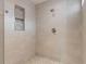 Modern shower with sleek, large-format tiles and a pebble floor, creating a spa-like ambiance at 964 Dekalb Ne Ave # 112, Atlanta, GA 30307