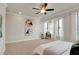 Bedroom featuring a ceiling fan, neutral tones, and large windows for lots of natural light at 2030 Main Nw St # 205, Atlanta, GA 30318