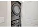 Modern, stackable, front loading Samsung washer and dryer in a closet space at 2030 Main Nw St # 205, Atlanta, GA 30318