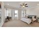 Serene main bedroom with plenty of natural light, a ceiling fan, and comfortable furniture for a relaxing retreat at 2030 Main Nw St # 205, Atlanta, GA 30318