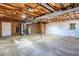 Unfinished basement with utilities, exposed ceiling, and concrete floor offers potential for customization and ample storage at 510 Debra Dr, Marietta, GA 30066