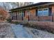 Inviting front porch with red door and black railings, perfect for enjoying the outdoors at 510 Debra Dr, Marietta, GA 30066