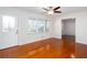 Bright living room with hardwood floors, ceiling fan, and a view of the front yard at 510 Debra Dr, Marietta, GA 30066