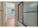 Bathroom featuring tiled shower with sleek glass door at 553 Somersby Dr, Dallas, GA 30157