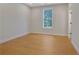 Bedroom featuring wood-look flooring and a window at 553 Somersby Dr, Dallas, GA 30157