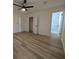 Primary bedroom has hard surface floors and an ensuite bathroom at 8168 Spring Ct, Riverdale, GA 30274