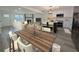 Staged eat in kitchen featuring a wood table with seating at 8168 Spring Ct, Riverdale, GA 30274