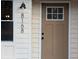 Close up of the house number and paneled front door at 8168 Spring Ct, Riverdale, GA 30274