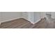 Close up of hardwood floors and white base trim at 8656 Webb Rd, Riverdale, GA 30274