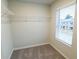 Walk-in closet with wire shelving and a window providing natural light at 8656 Webb Rd, Riverdale, GA 30274