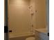 Bathroom featuring a tub with white tile surround and shower head at 316 Oak Arms Way, Woodstock, GA 30188