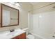 Bright bathroom features a shower-tub combo, a single sink vanity, and neutral paint at 848 Capitol View Nw Ave, Atlanta, GA 30318