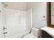 This bathroom features a shower-tub combo, toilet, and a dark vanity sink at 848 Capitol View Nw Ave, Atlanta, GA 30318