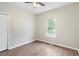 Cozy bedroom with ample natural light from the window and a ceiling fan, providing a comfortable space at 848 Capitol View Nw Ave, Atlanta, GA 30318