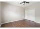 Bright bedroom featuring wood-look floors and a closet with folding doors at 848 Capitol View Nw Ave, Atlanta, GA 30318