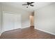 Spacious bedroom features wood-look floors, neutral paint, and a ceiling fan at 848 Capitol View Nw Ave, Atlanta, GA 30318