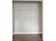 Walk-in closet features wood look floors and wire shelving for organization at 848 Capitol View Nw Ave, Atlanta, GA 30318