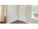 Bright entryway with wood-look flooring, leading to other rooms in the house at 848 Capitol View Nw Ave, Atlanta, GA 30318