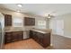 Open kitchen with granite counters, stainless steel appliances, and dark cabinets, great for cooking and entertaining at 848 Capitol View Nw Ave, Atlanta, GA 30318