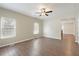 Inviting living room showcasing wood-look flooring, light-colored walls and a ceiling fan at 848 Capitol View Nw Ave, Atlanta, GA 30318