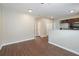 Bright living area with wood floors leading to the kitchen, offering an open layout for versatile use at 848 Capitol View Nw Ave, Atlanta, GA 30318