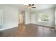 Spacious, light-filled living room with wood-look floors and neutral paint at 848 Capitol View Nw Ave, Atlanta, GA 30318