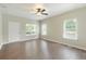 Large, bright living room features wood-look floors and fresh paint at 848 Capitol View Nw Ave, Atlanta, GA 30318