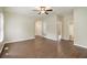 Expansive living room features wood-look floors, neutral walls and a glimpse into a connecting room at 848 Capitol View Nw Ave, Atlanta, GA 30318