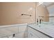 Close-up of a bathroom with a glass vessel sink and granite countertops at 10846 Sunfield Way, Hampton, GA 30228