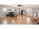 Large, bright bonus room featuring hardwood floors, multiple windows, and ample space for office setup at 2434 Soft Maple St, Atlanta, GA 30360