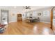 Spacious bonus room featuring hardwood floors, a ceiling fan, and plenty of natural light at 2434 Soft Maple St, Atlanta, GA 30360