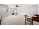 Large bonus room with neutral carpet, ceiling fan, and multiple windows providing natural light at 2434 Soft Maple St, Atlanta, GA 30360
